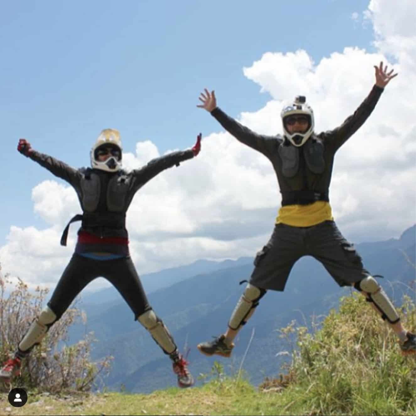 Serena & John Jumping in Bike gear