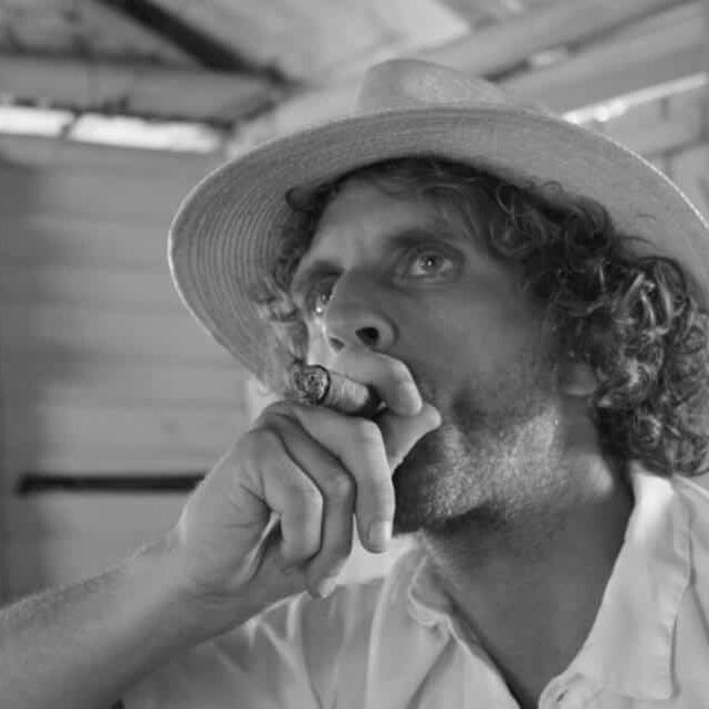 John Smoking Cigars in Cuba